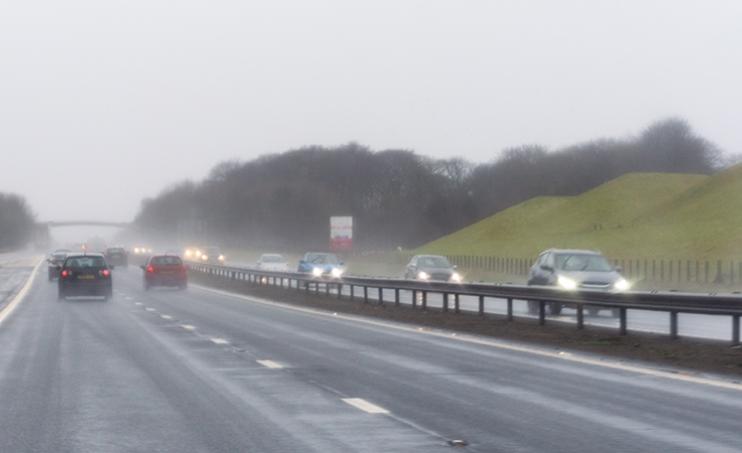 Cars on a motorway in the rain